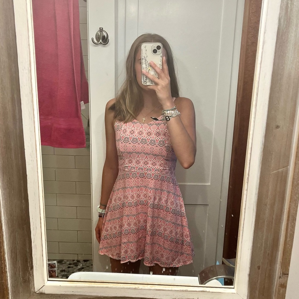 Aeropostale size M pink patterned sundress. Cross-cross straps on back.